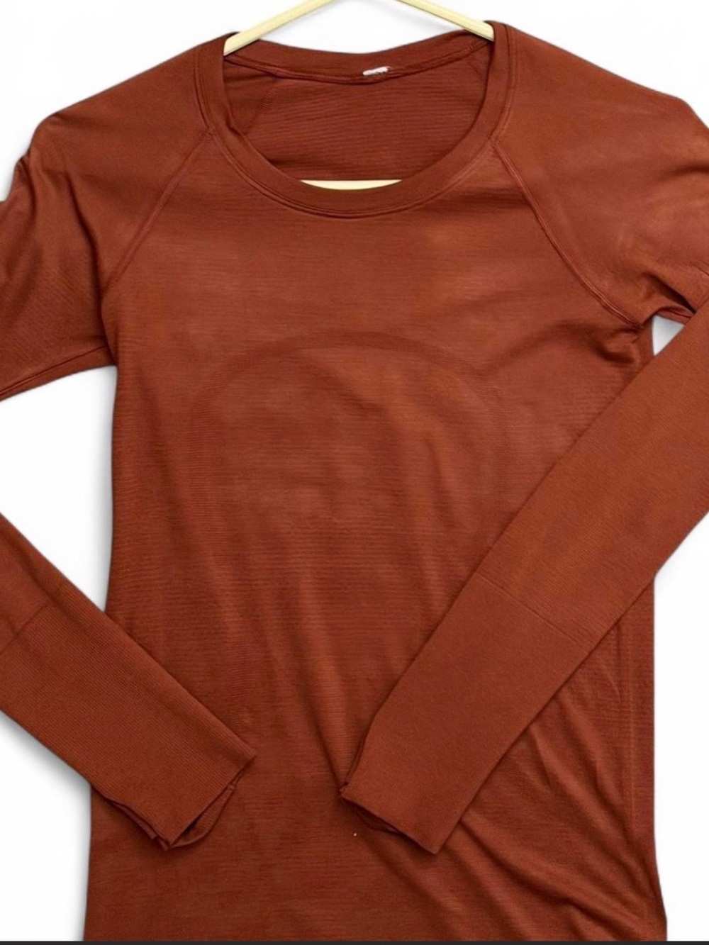 Lululemon Swiftly Tech Long Sleeve Shirt 2.0 in a dark terracotta color